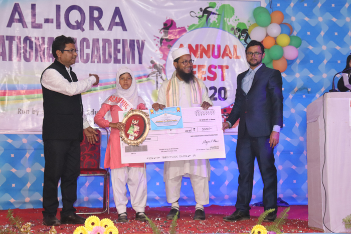 Khaleda Begum student of AINA receiving Academic Excellence award